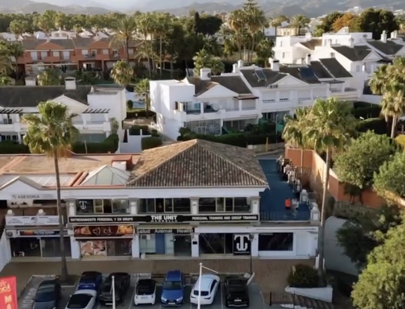The Unit Fit gym in Marbella, seen from above with the mountains behind